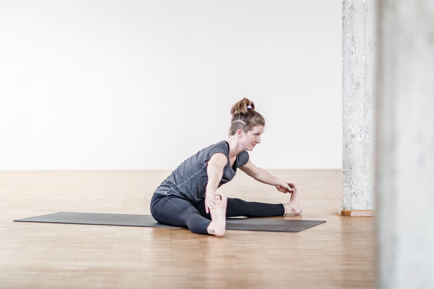 Figure 7 Wide-legged forward bend