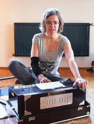 Lisa playing the harmonium