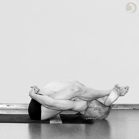 Supta-Kurmasana
