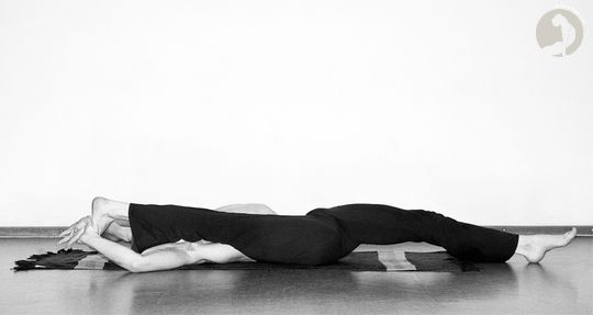 Supta  Trivikramasana